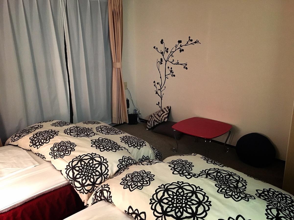 Guest House Hokorobi Fukuoka  Bagian luar foto