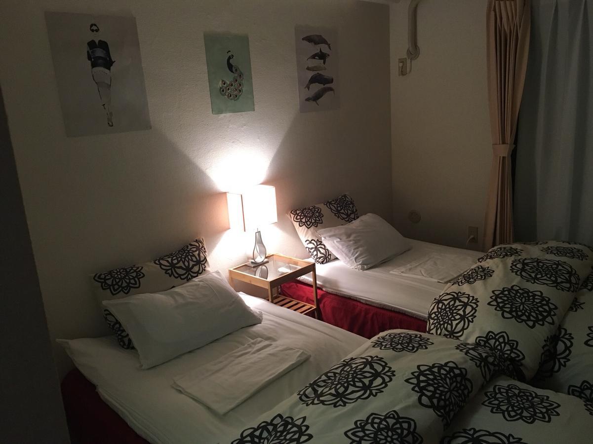Guest House Hokorobi Fukuoka  Bagian luar foto