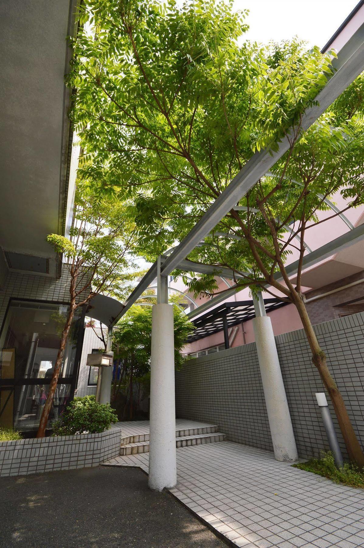Guest House Hokorobi Fukuoka  Bagian luar foto