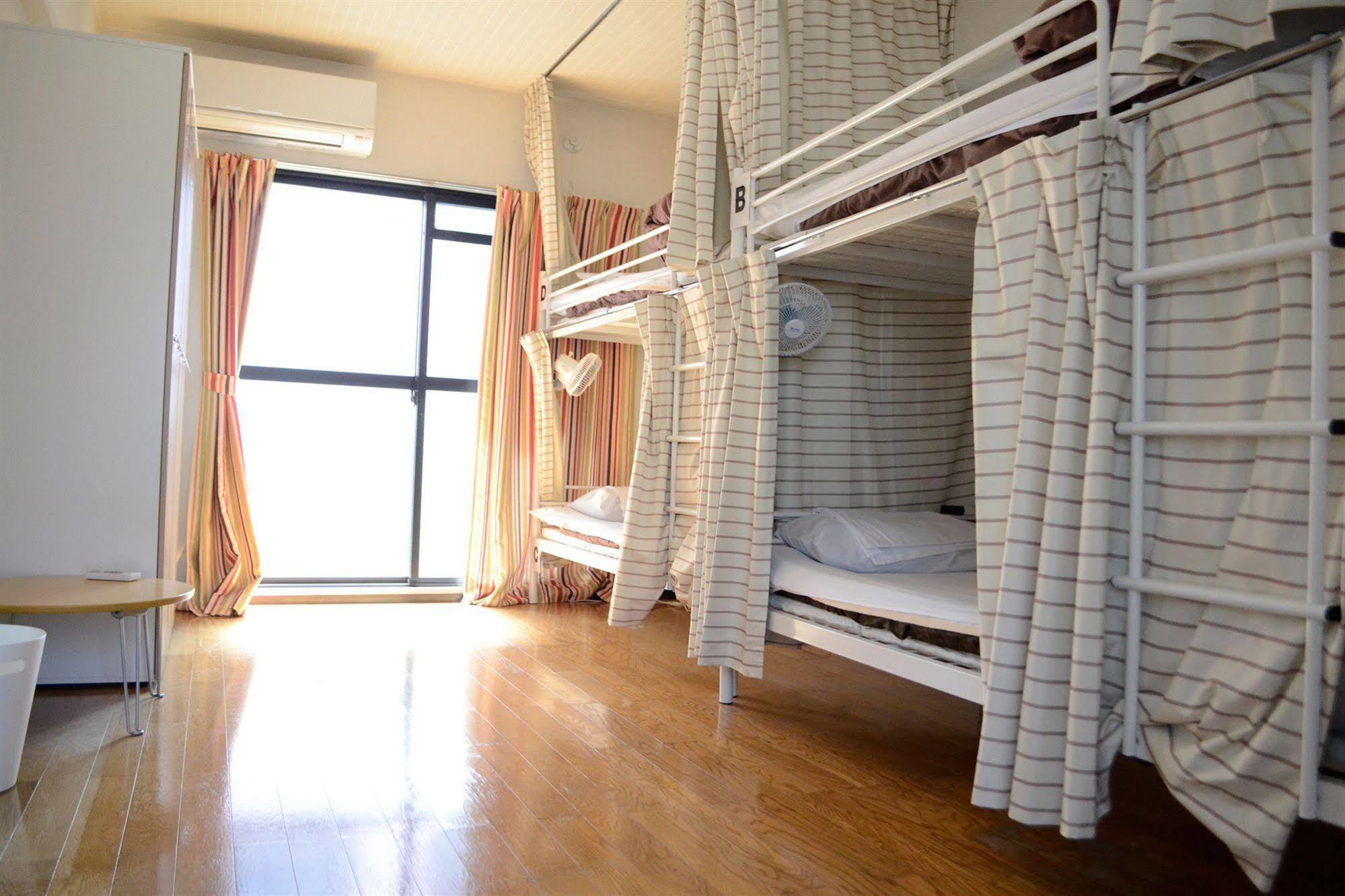 Guest House Hokorobi Fukuoka  Bagian luar foto